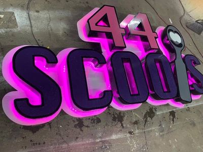 Lit channel letters on an ice cream shop