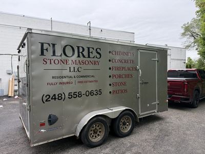 Flores Stone Masonry. Trailer lettering