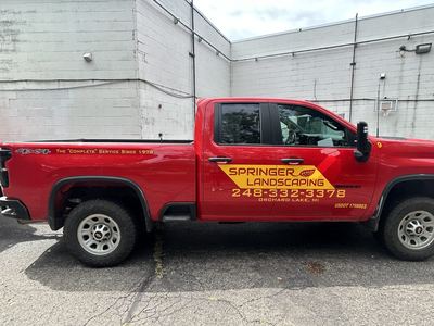 Springer Landscaping. Matched truck and trailer lettering
